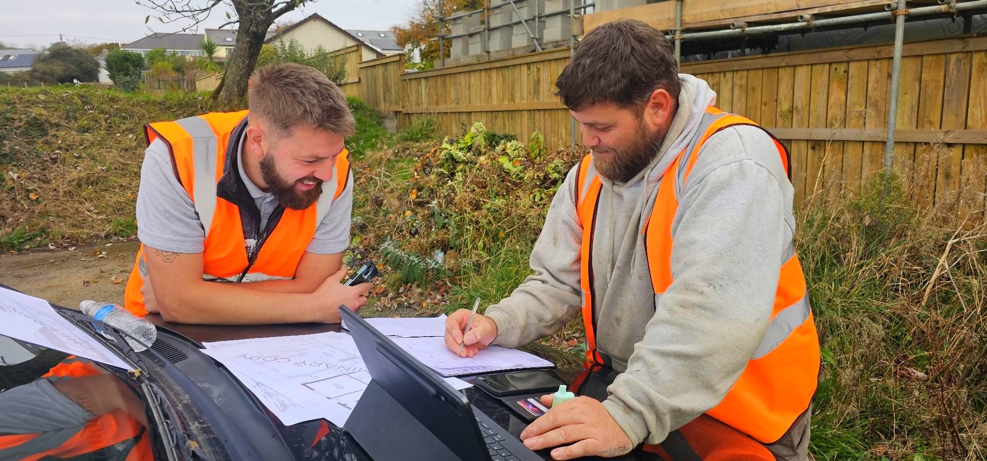 2-Guys-writing-image